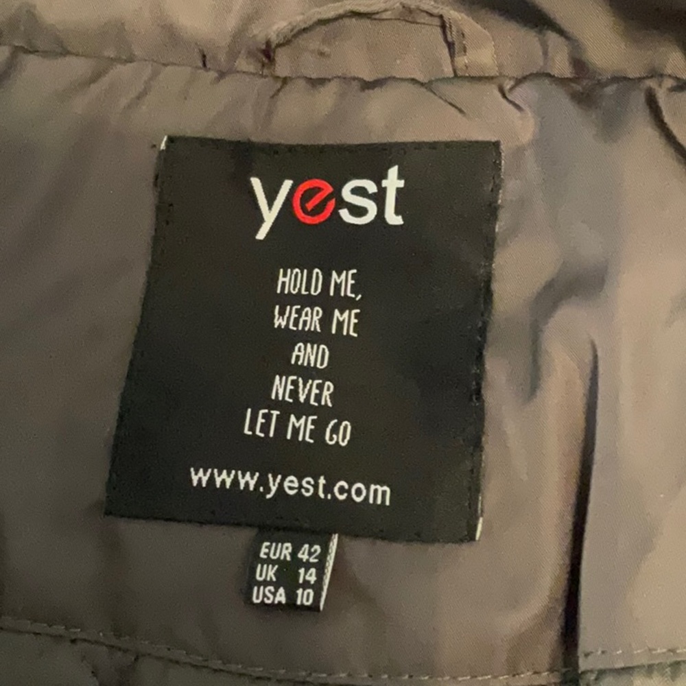Yest Brown Puffer Coat. New condition,       Size 10.